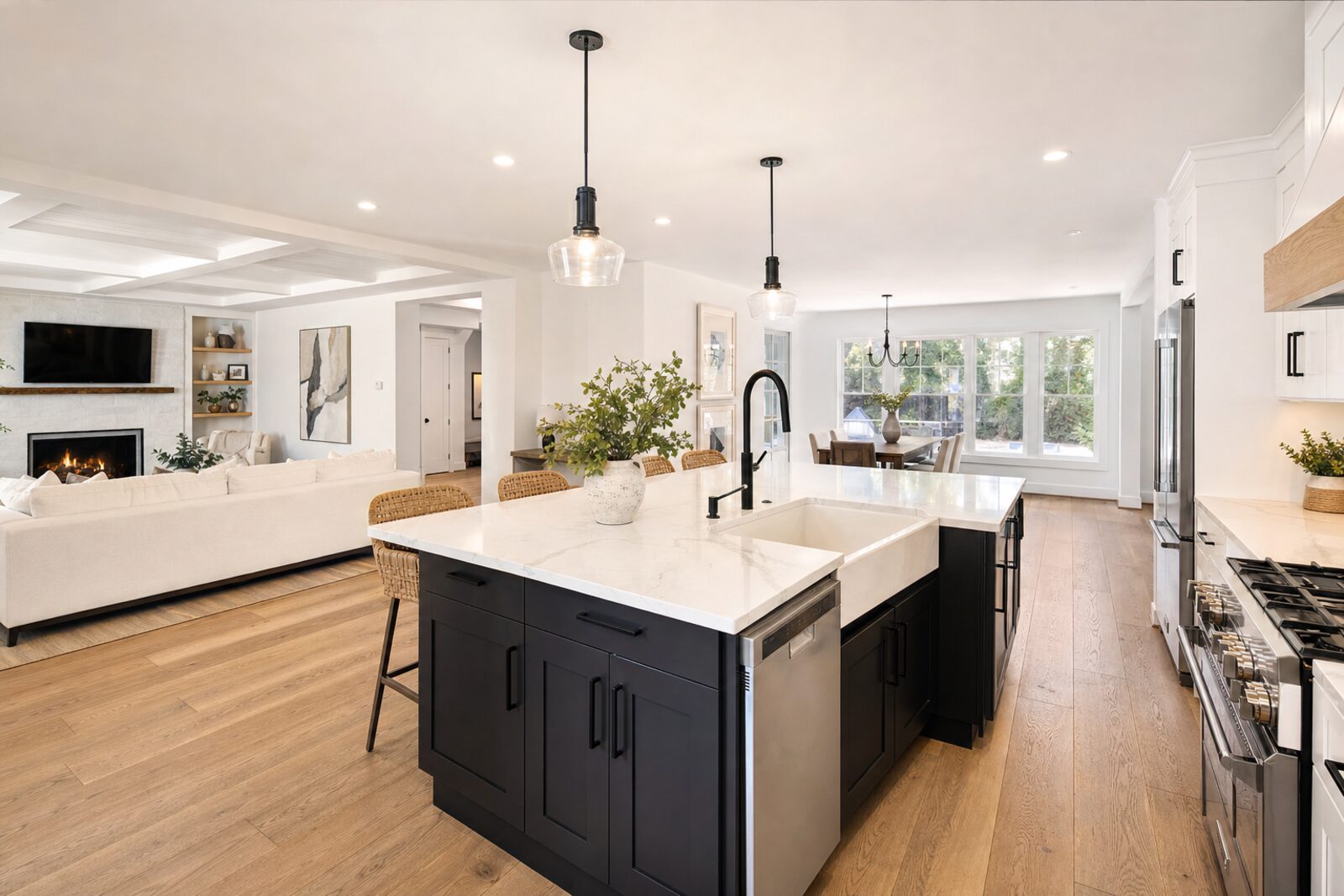 Beautifully renovated open-concept kitchen and living space by Bryerson Homes